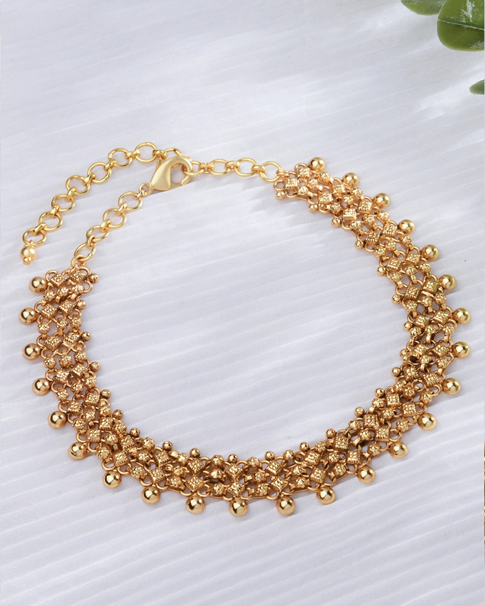 golden necklace adorned