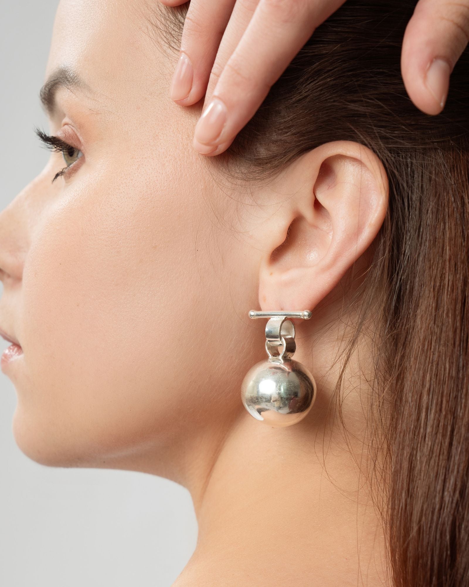 globe earrings - silver tone