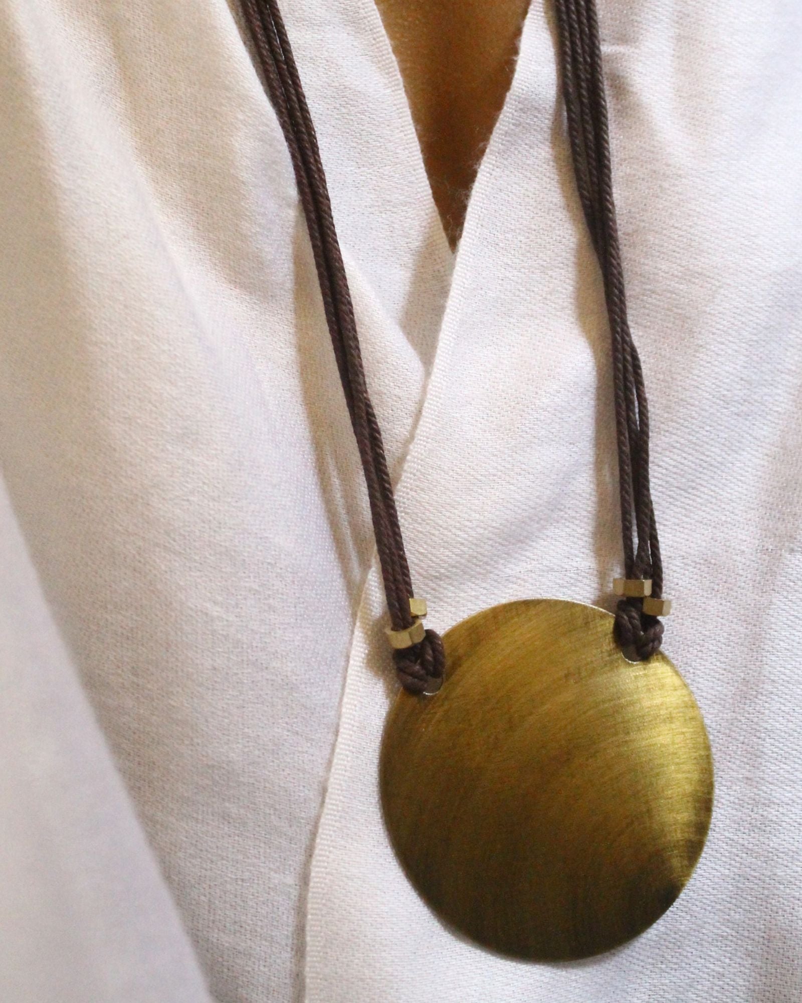 BRASS CIRCLE NECKPIECE