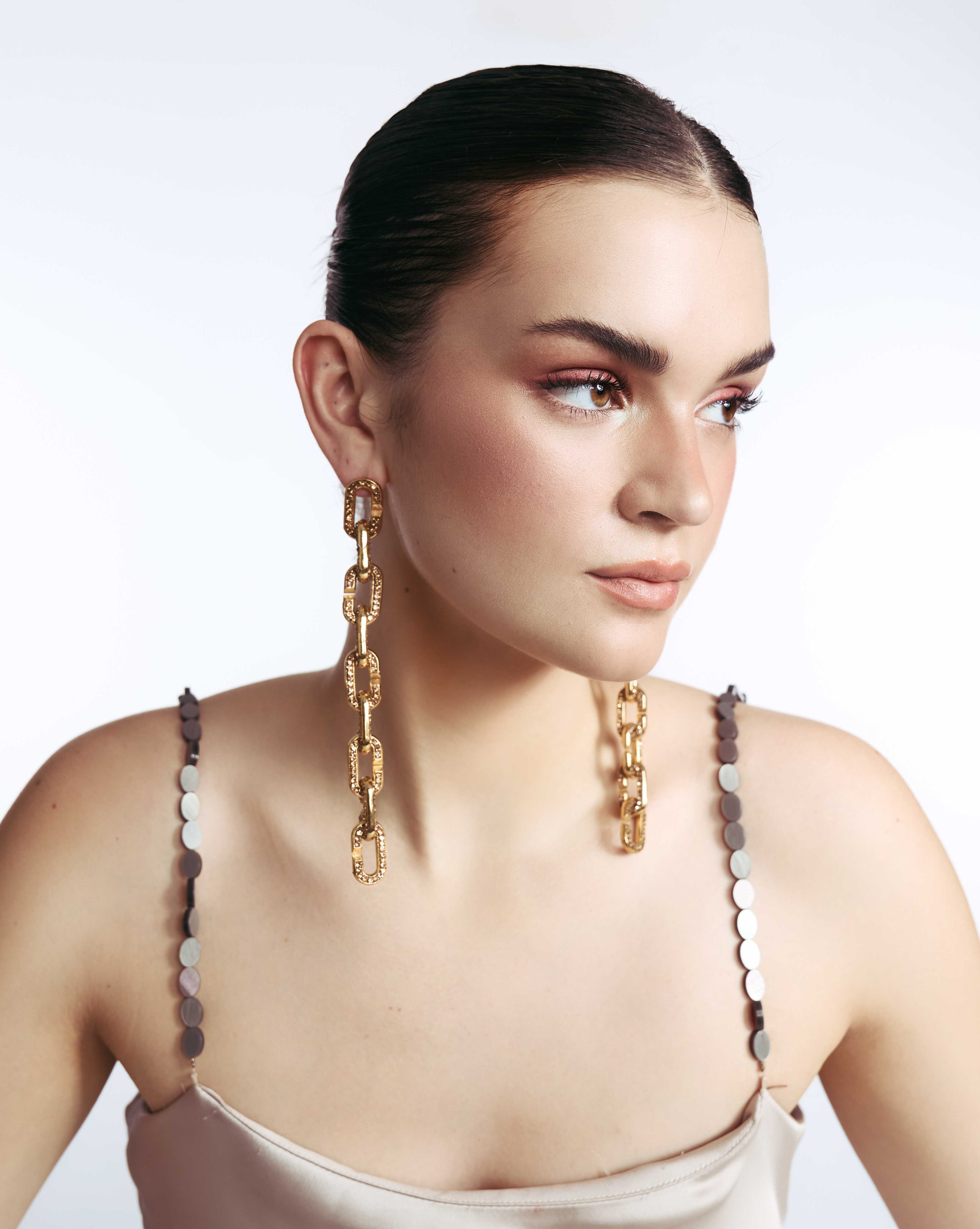 Stellar Link Earrings In Gold