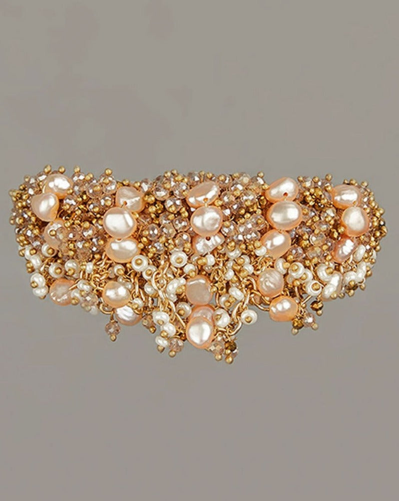 Contemporary Peach Pearl Studded Bracelet With Gold Beads