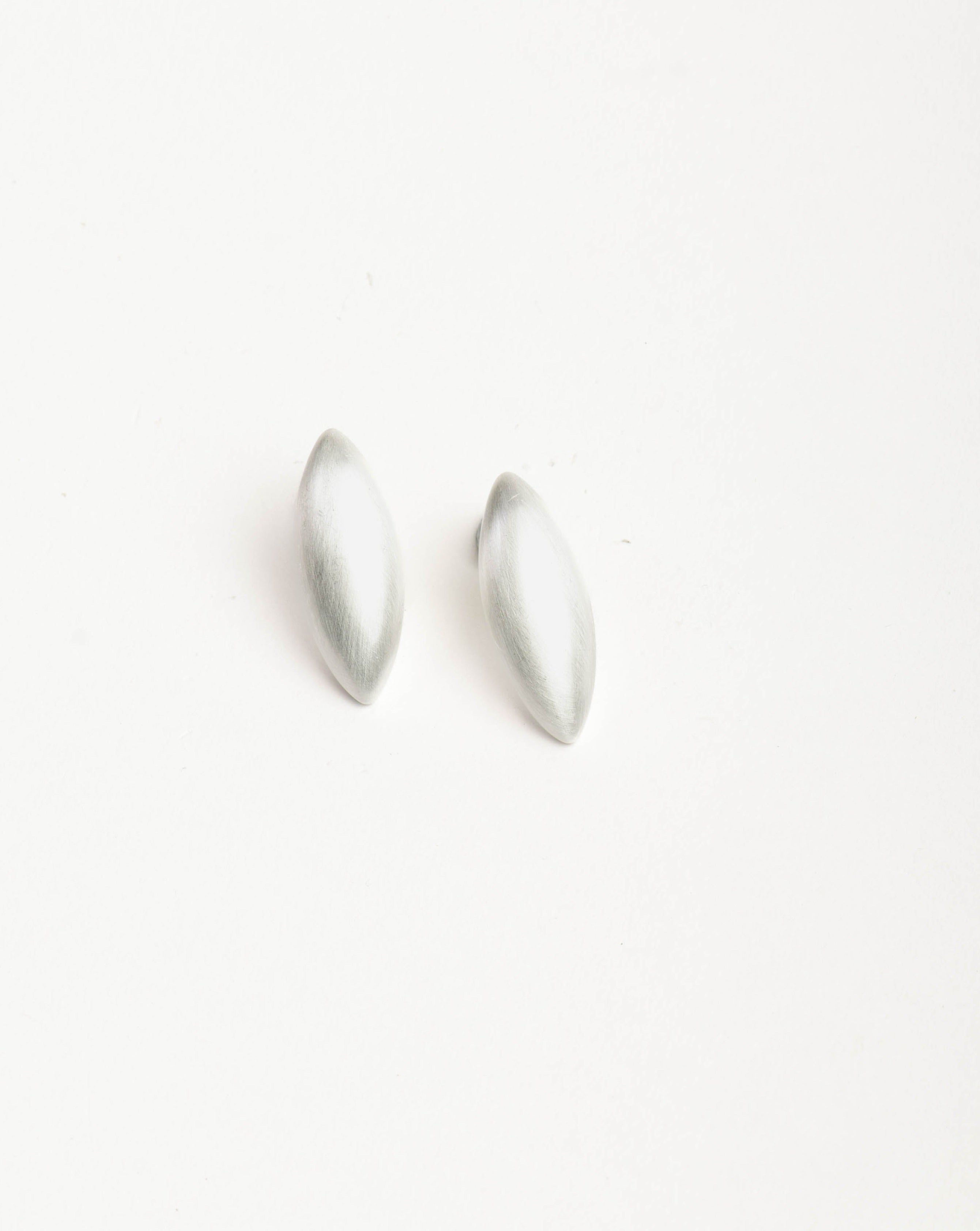 Charu Studs In White