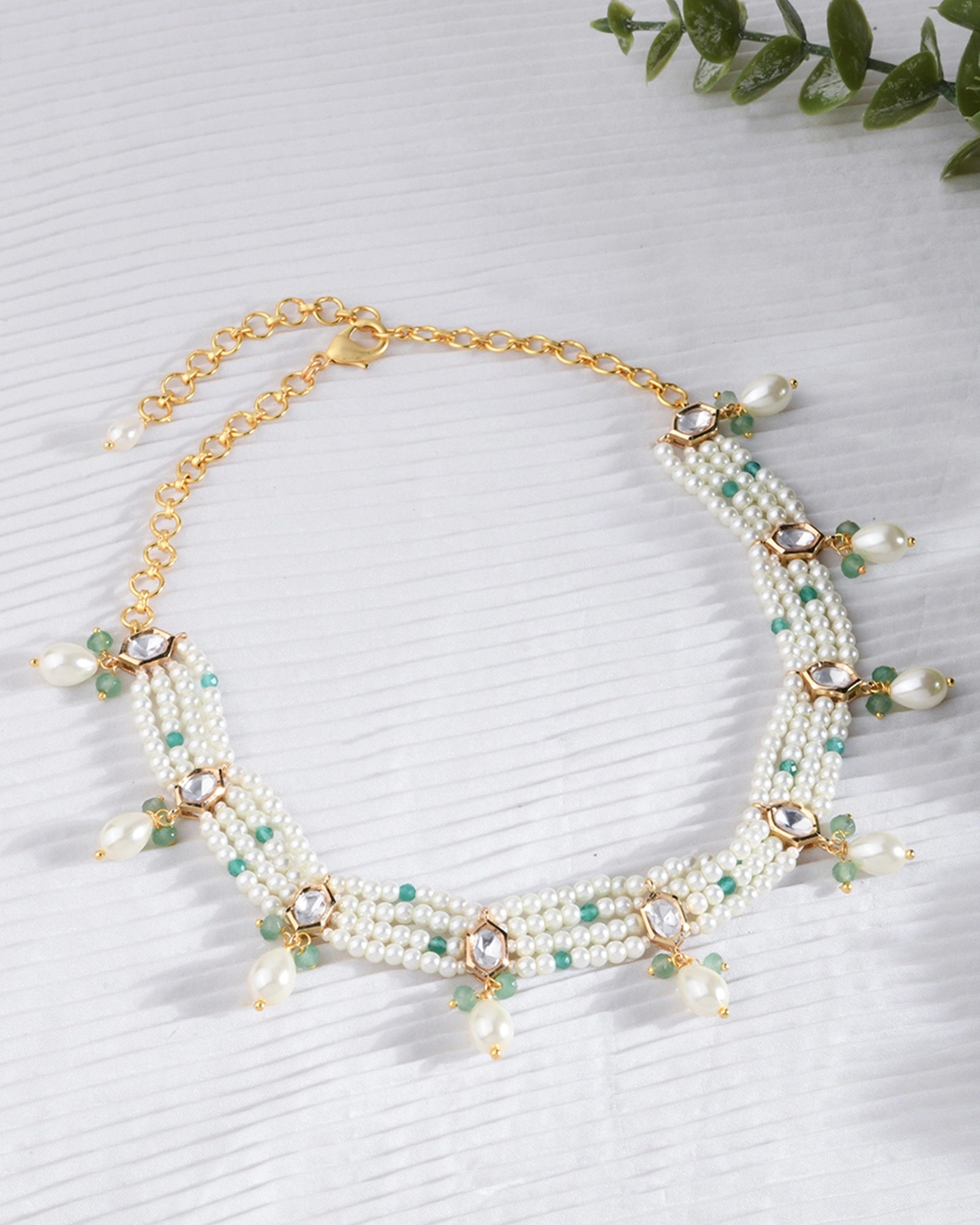 necklace featuring layered pearl strands with gracefully hanging pearls