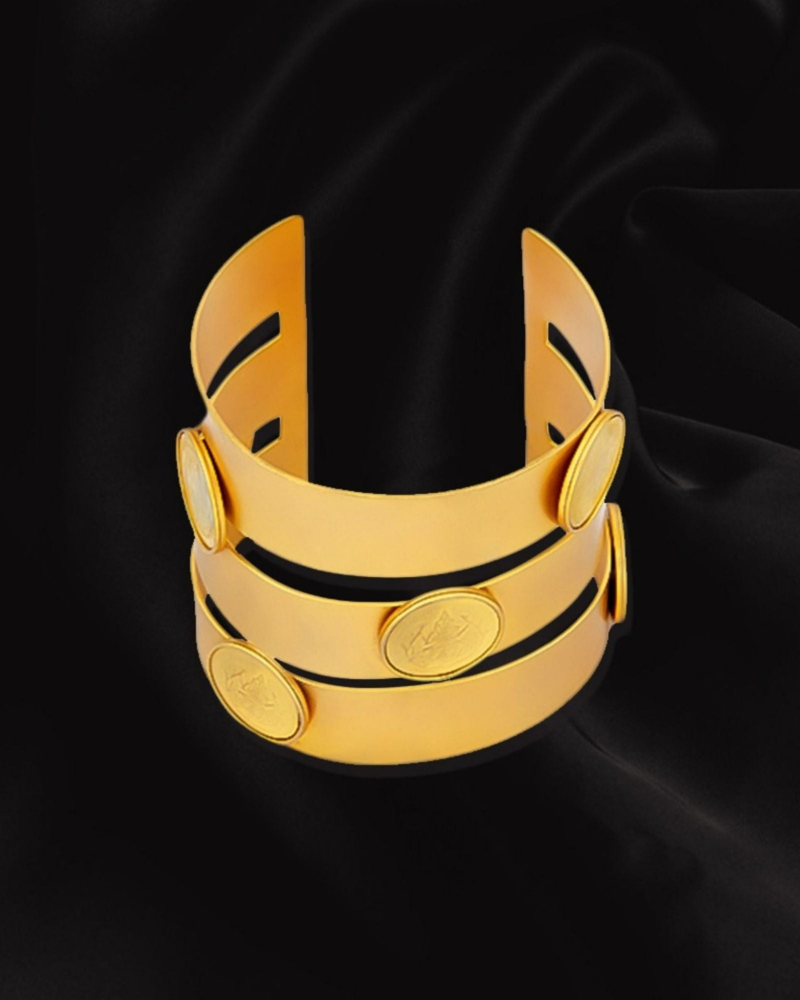 Gold triad coin hand cuff