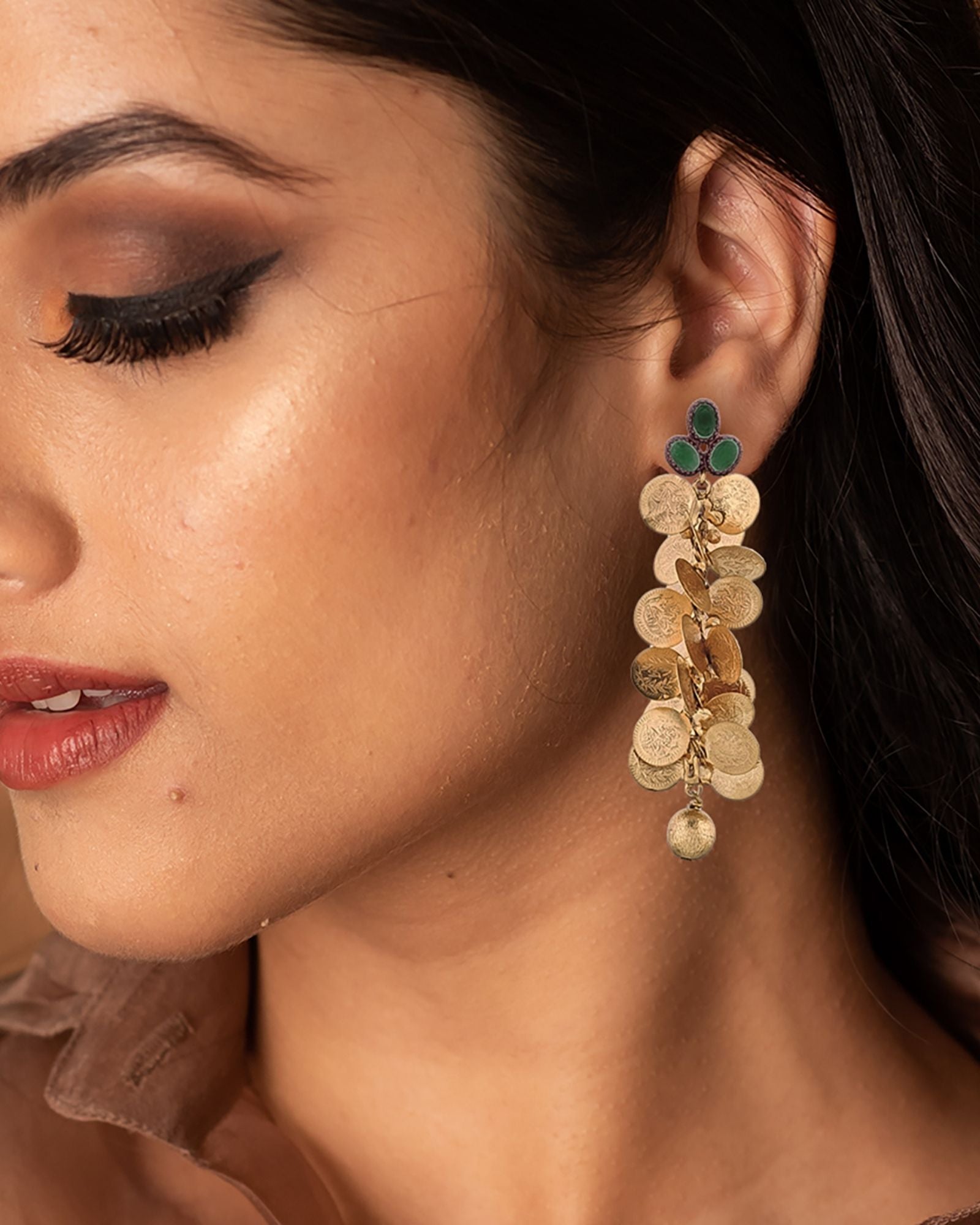 Gold coin cluster earrings with green crystals