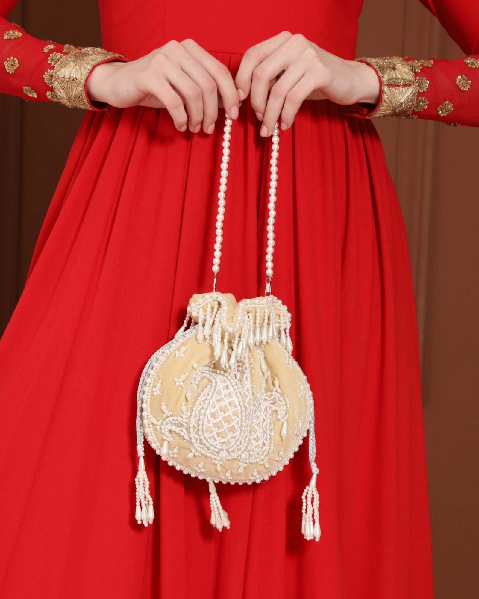 Sukoon Hand Embroidered Potli with Pearl Handle