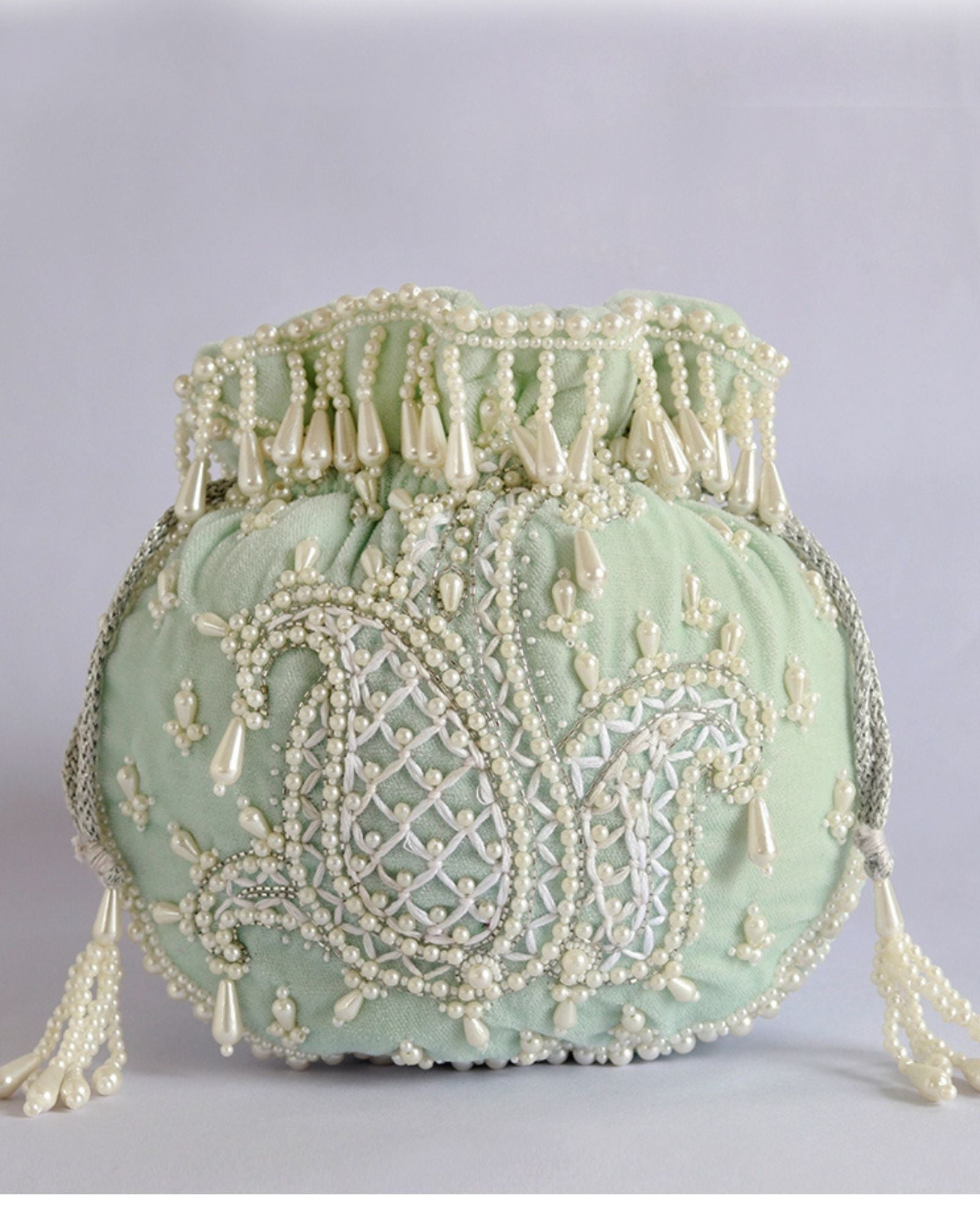 Sukoon Hand Embroidered Potli with Pearl Handle